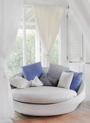A quiet daybed corner inside the villa